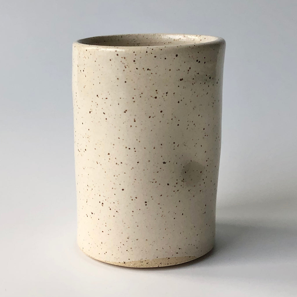 Speckled clay thumb print tumbler glazed in Apple Orchard Ash Glaze